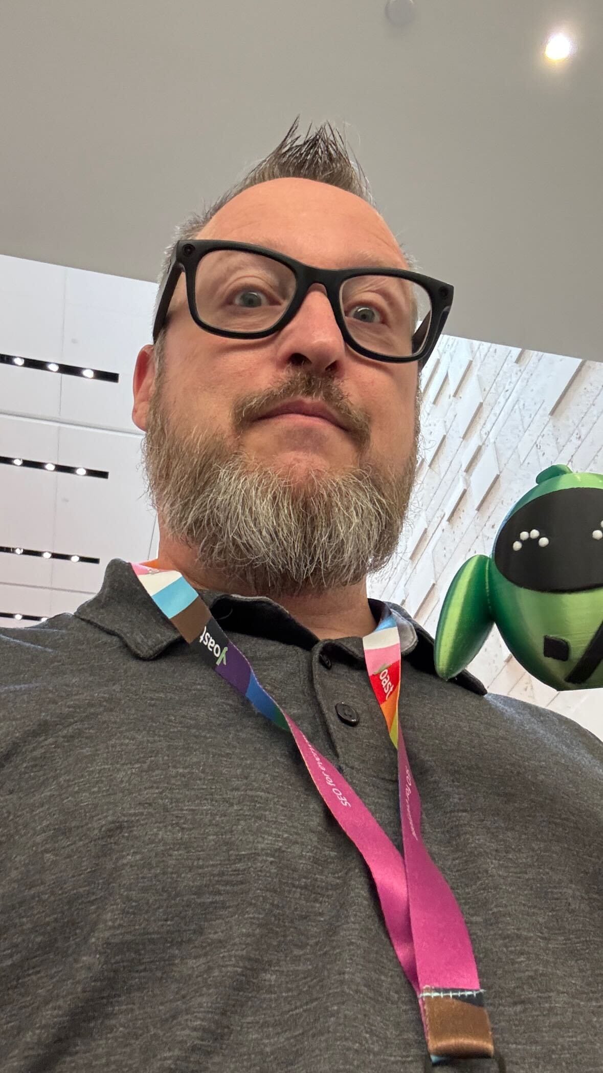 Hank poses with Kickbot, the Kickbox mascot